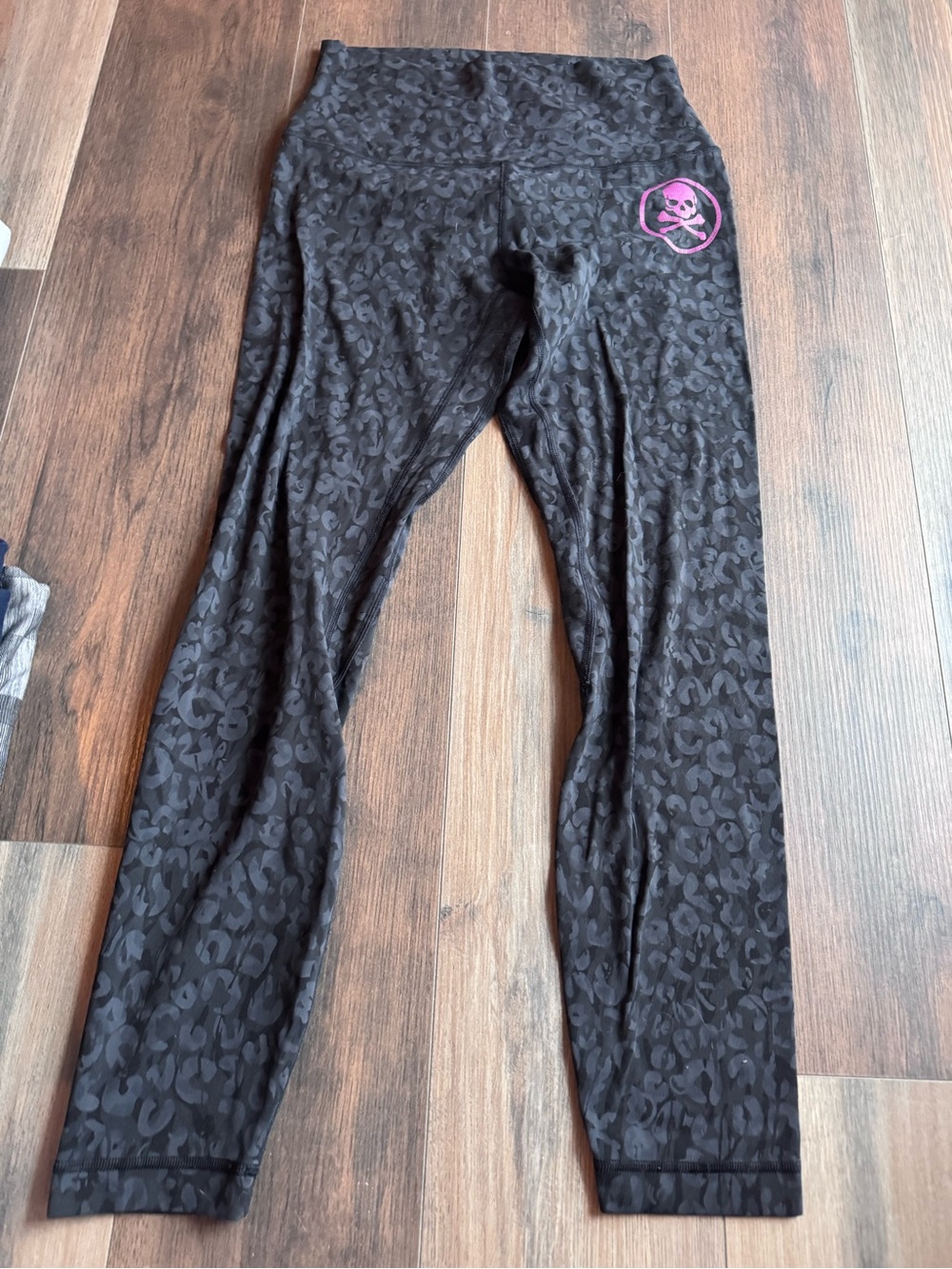 lululemon athletica Black Leopard-Print Leggings with Pink Skull Logo